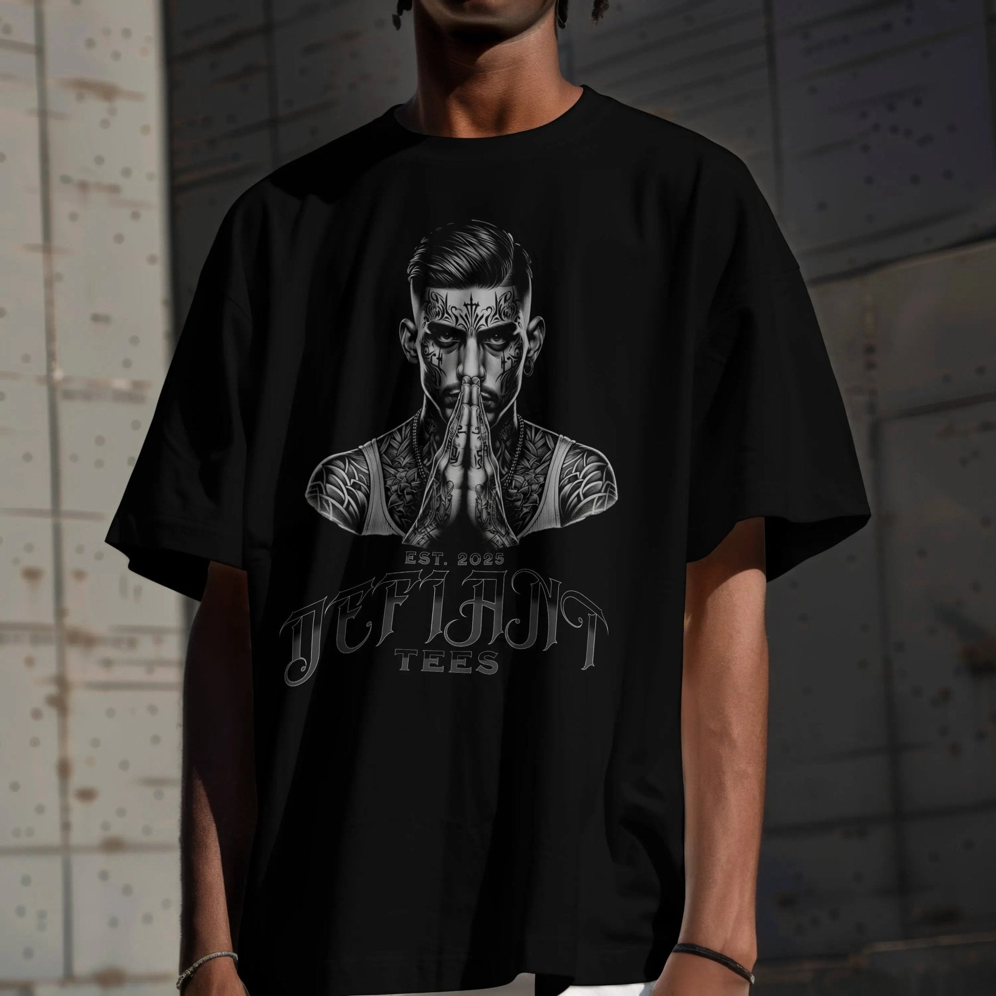 man wearing defiant tattoo tshirt front