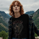 Woman wearing Defiant 9mm with angel wings t-shirt
